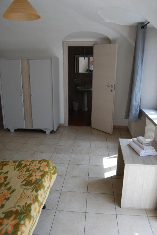 Postel nebo postele na pokoji v ubytování Albergo della Posta