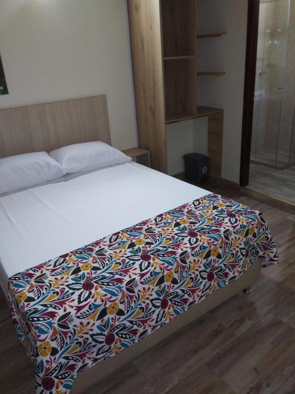 Postel nebo postele na pokoji v ubytování Hotel Boutique Street 50