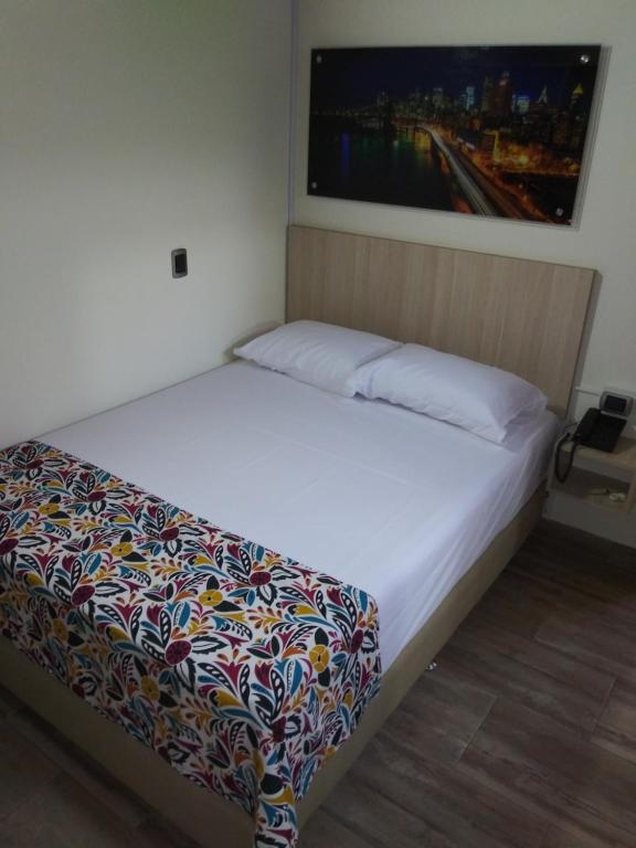 Postel nebo postele na pokoji v ubytování Hotel Boutique Street 50