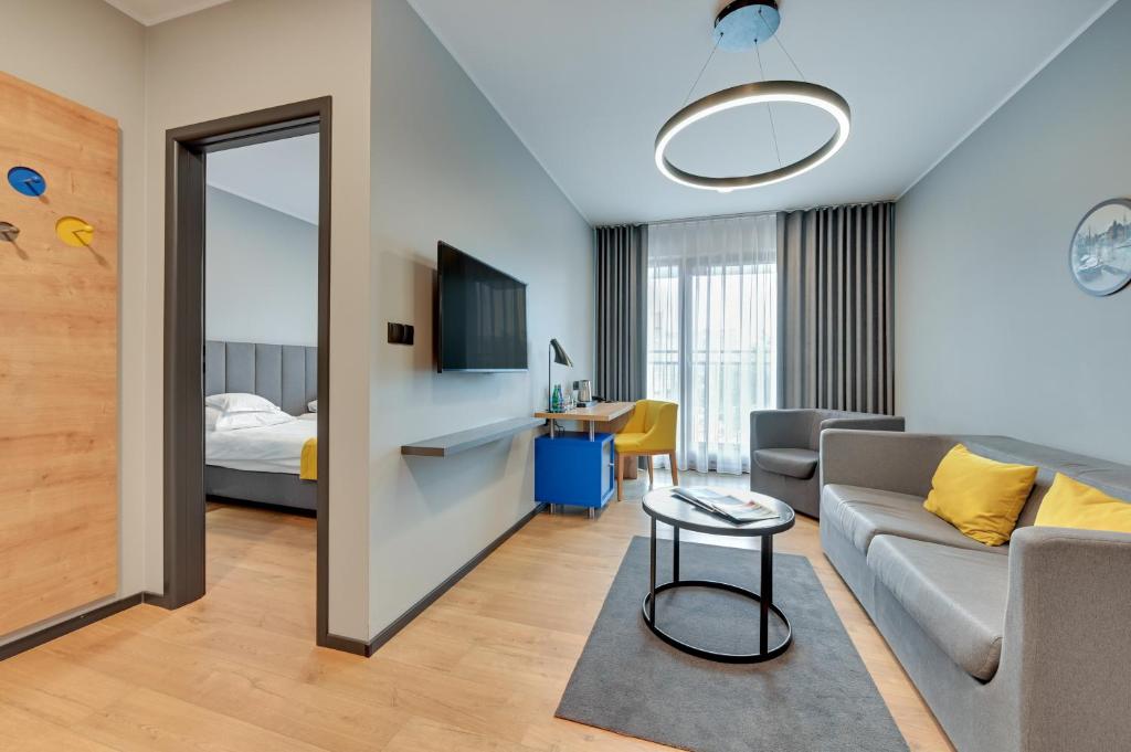 Postel nebo postele na pokoji v ubytování HOTEL NUMBER ONE BY GRANO Gdańsk - GRANO LIFE Gdańsk