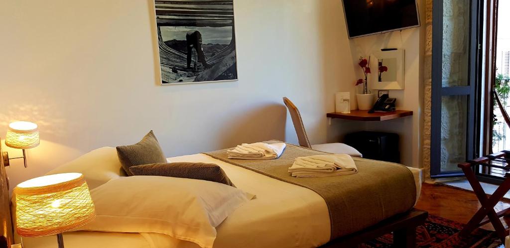 Postel nebo postele na pokoji v ubytování San Teodoro