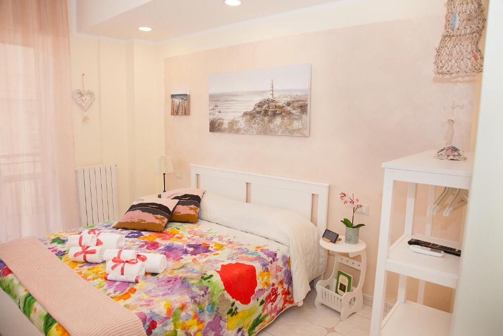Posteľ alebo postele v izbe v ubytovaní b&b Napoli Capitale