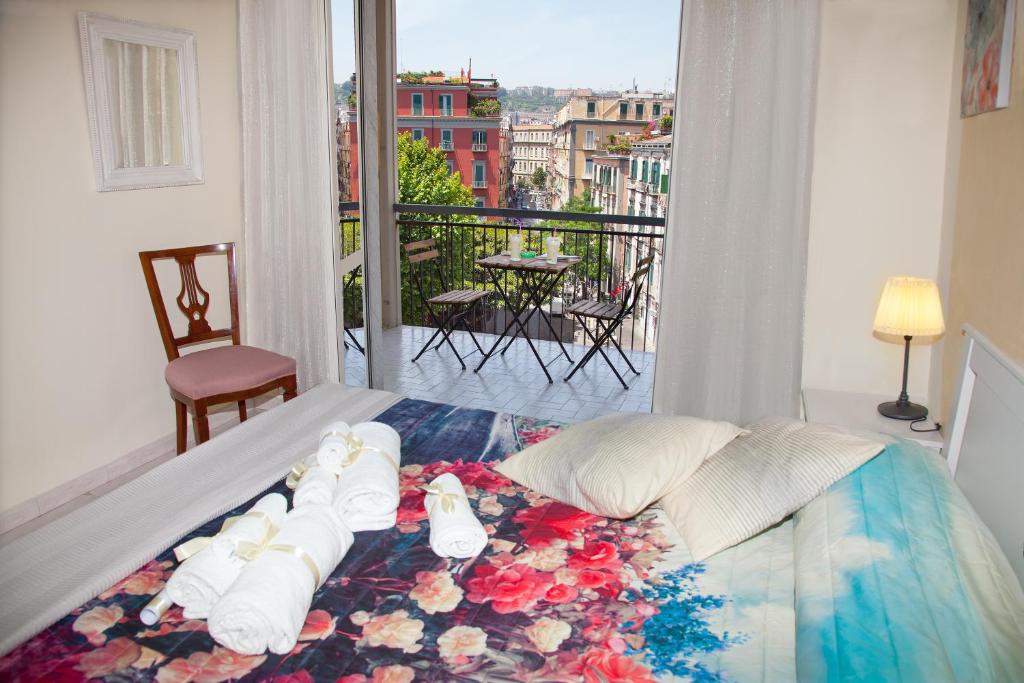 Posteľ alebo postele v izbe v ubytovaní b&b Napoli Capitale