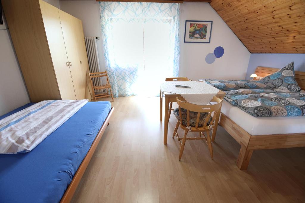 Postel nebo postele na pokoji v ubytování Pension Altvogtshof