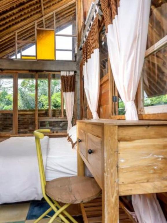 Postel nebo postele na pokoji v ubytování Lorong Homestay