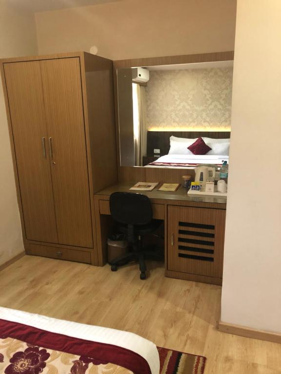 Postel nebo postele na pokoji v ubytování Hotel Harrison Palace