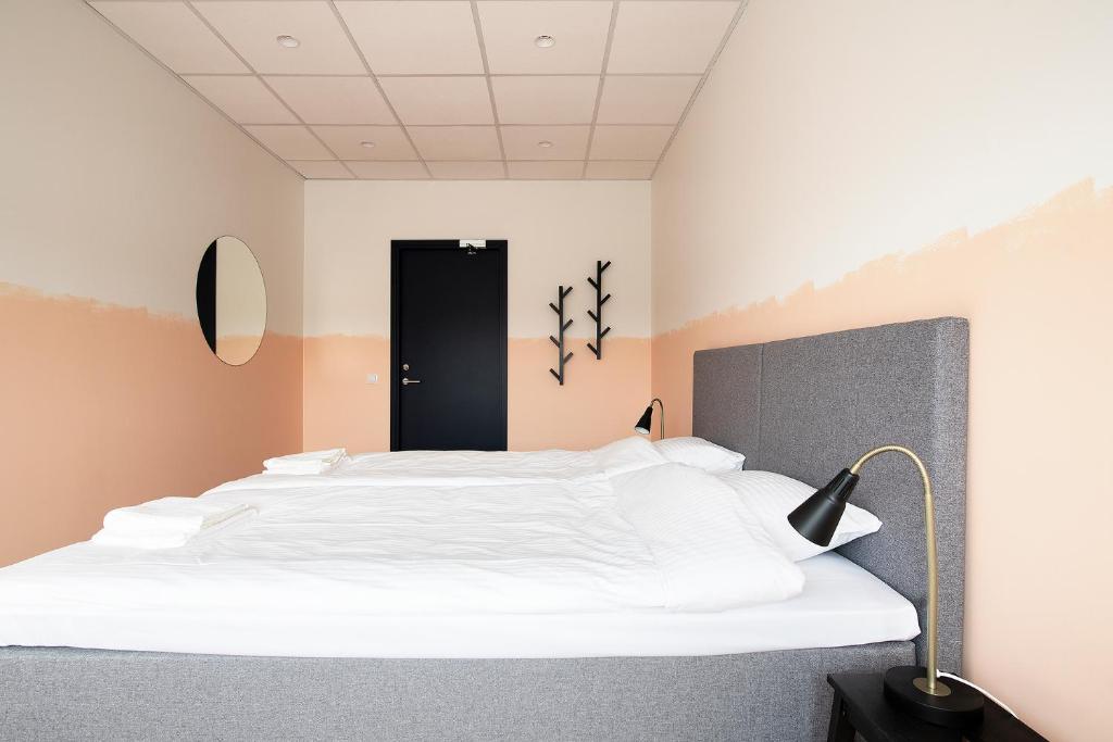 Postel nebo postele na pokoji v ubytování Neotel