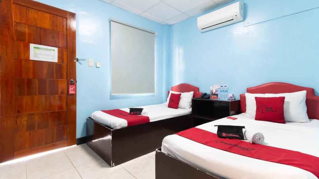 Voodi või voodid majutusasutuse RedDoorz @ Picas Sagkahan Tacloban toas