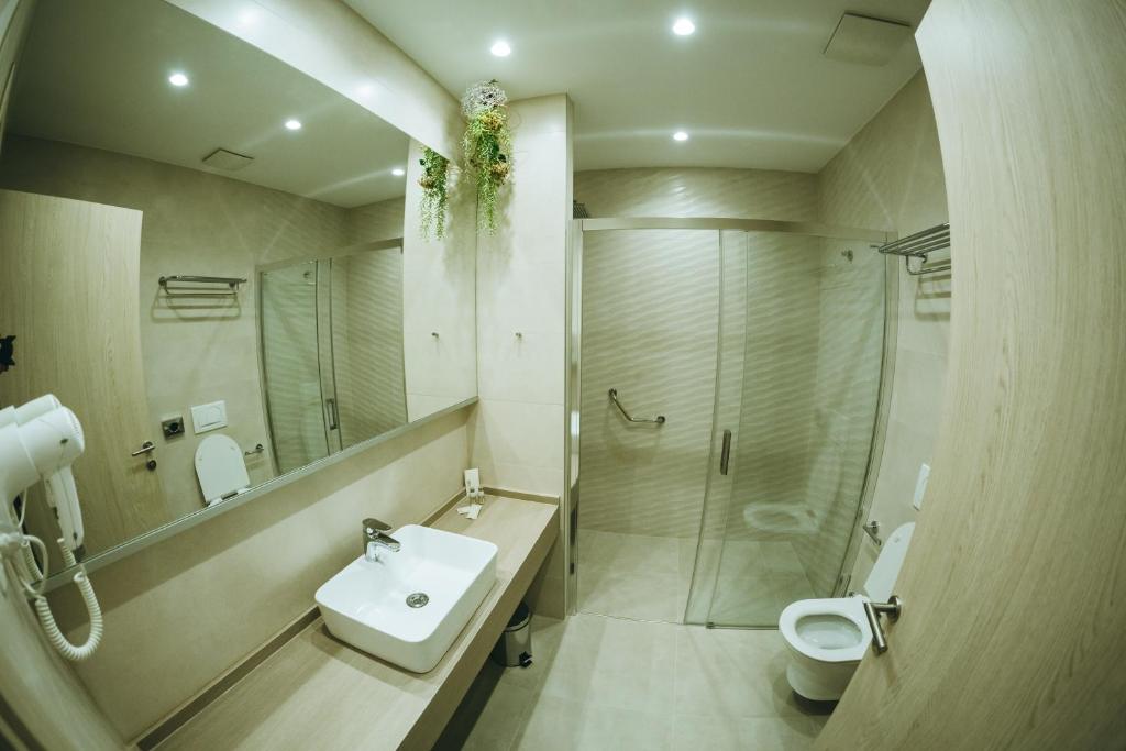 Koupelna v ubytování Hotel Verso