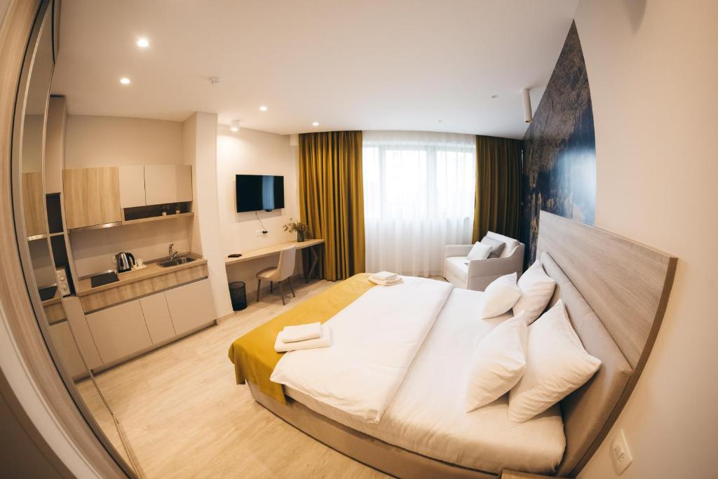 TV a/nebo společenská místnost v ubytování Hotel Verso