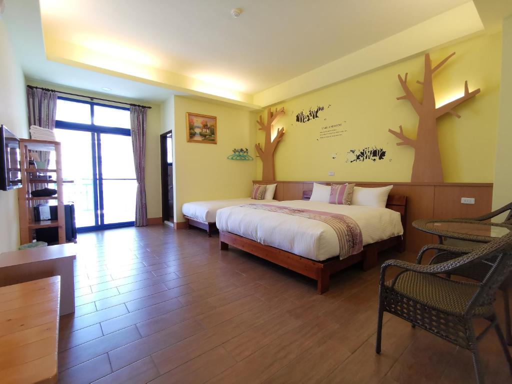 Postel nebo postele na pokoji v ubytování Love Ocean & Happy Bay HomeStay