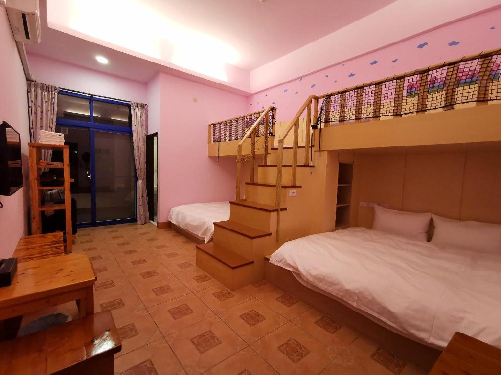 Postel nebo postele na pokoji v ubytování Love Ocean & Happy Bay HomeStay