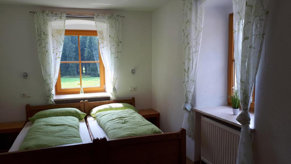 Postel nebo postele na pokoji v ubytování Ferienhaus Buxbaum