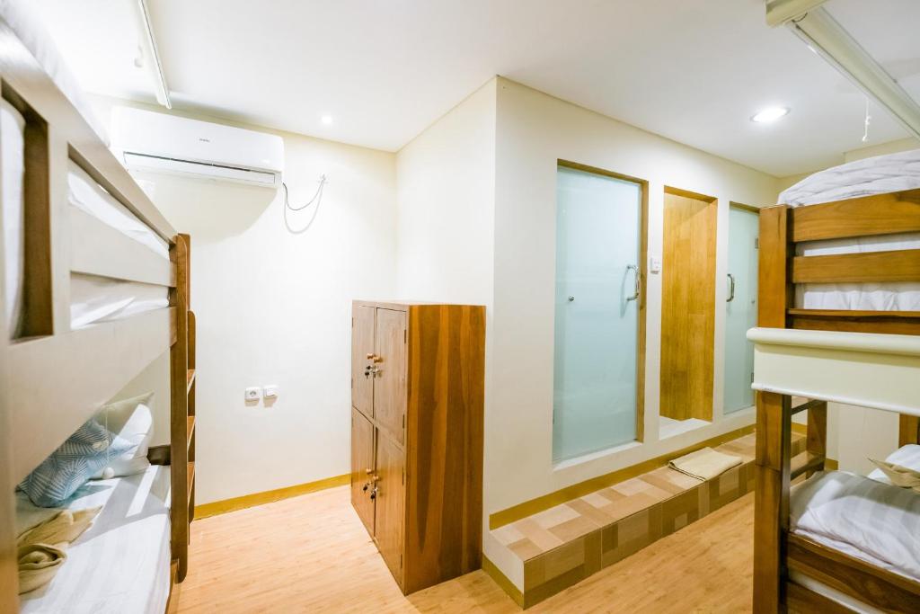Postel nebo postele na pokoji v ubytování Caroline Hostel