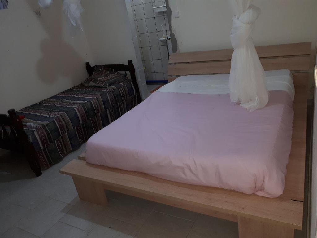 Postel nebo postele na pokoji v ubytování Refuge de Joel