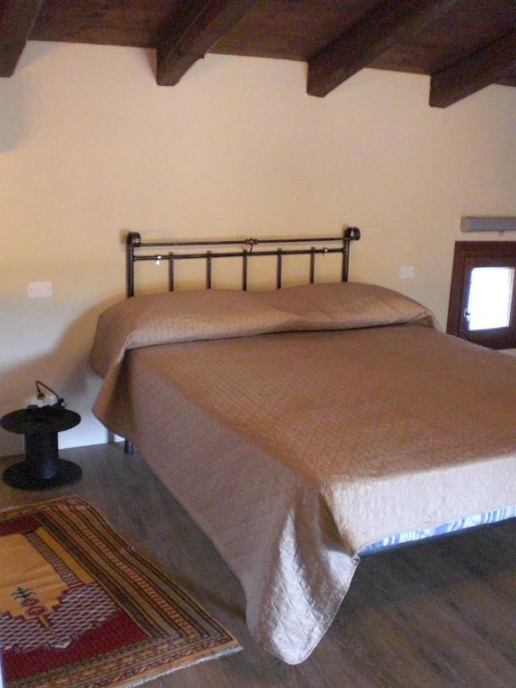 Postel nebo postele na pokoji v ubytování Venezia delle Nevi