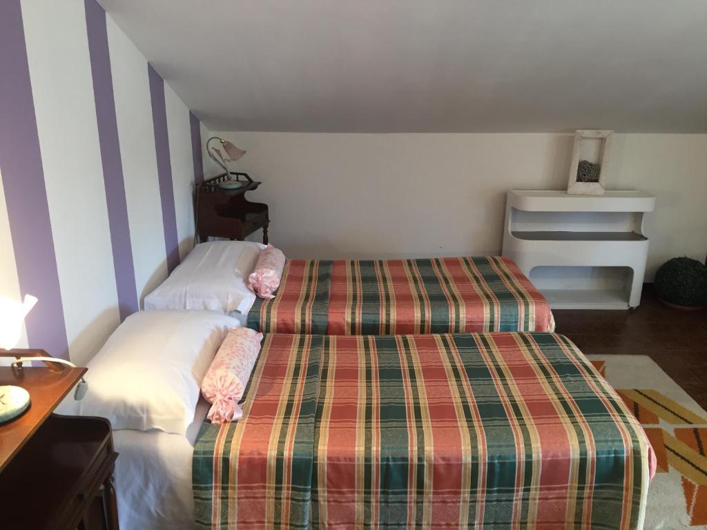 Postel nebo postele na pokoji v ubytování Cà 'd Gnese
