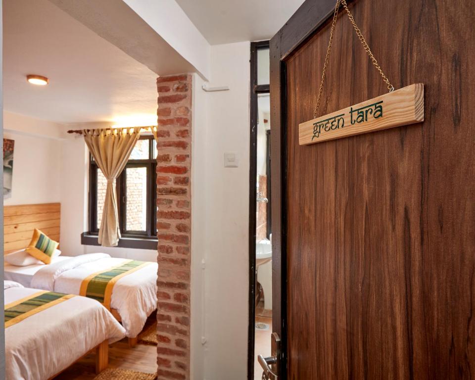 Postel nebo postele na pokoji v ubytování Mangal Chhen