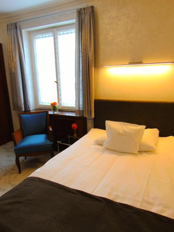 Postel nebo postele na pokoji v ubytování Boutiquehotel Oberkirch im Zentrum