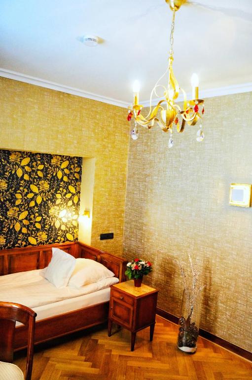 Postel nebo postele na pokoji v ubytování Boutiquehotel Oberkirch im Zentrum