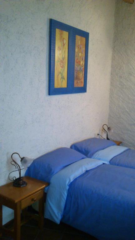 Postel nebo postele na pokoji v ubytování Cal Gabriel