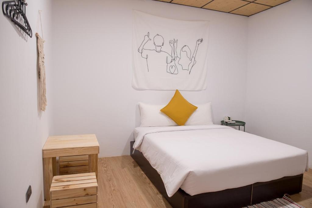 Ένα ή περισσότερα κρεβάτια σε δωμάτιο στο HELLO Make Yourself at Home