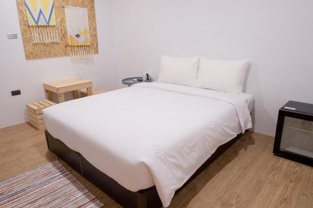 Ένα ή περισσότερα κρεβάτια σε δωμάτιο στο HELLO Make Yourself at Home