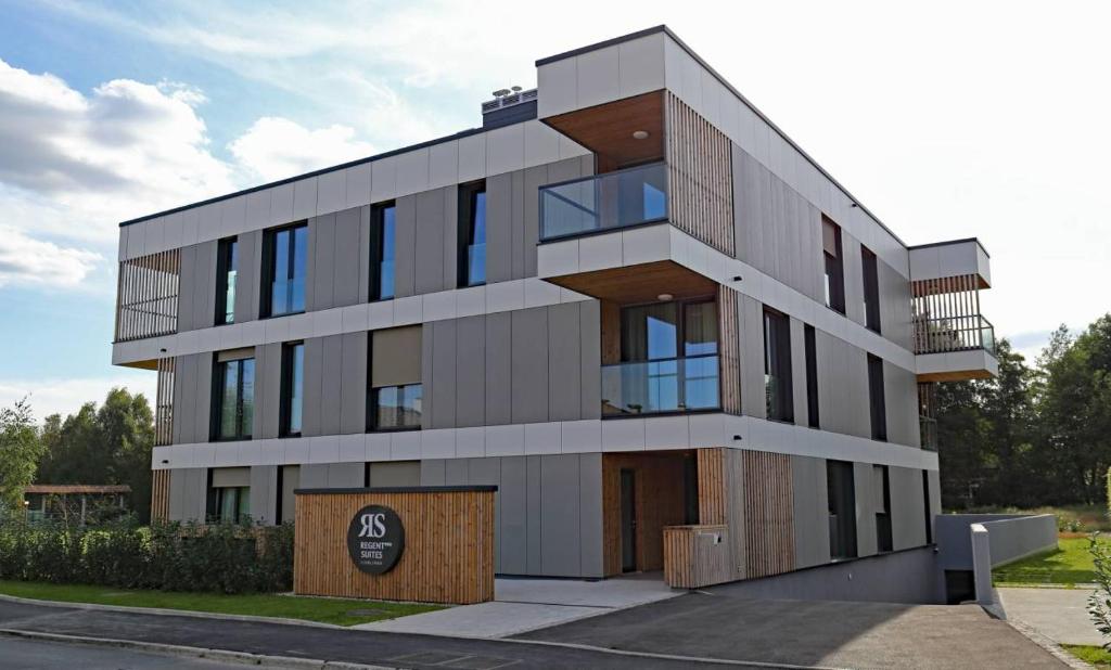 a modern building with a building at Regentova Suites Ljubljana in Ljubljana