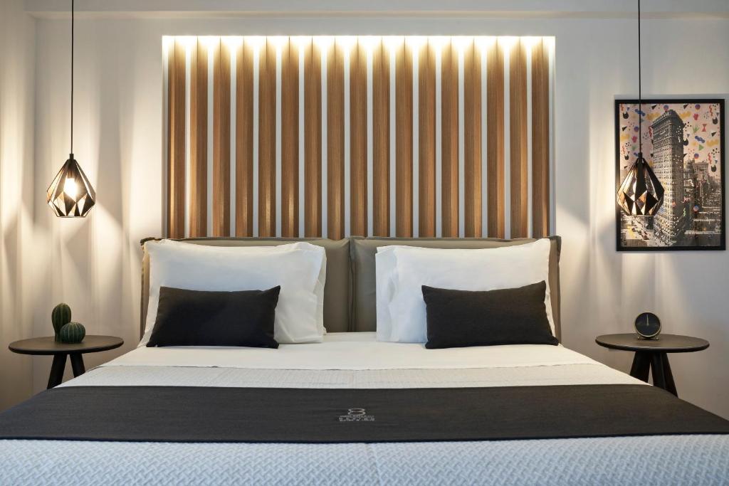 Posteľ alebo postele v izbe v ubytovaní Kolonaki 8 - Design Suites & Lofts