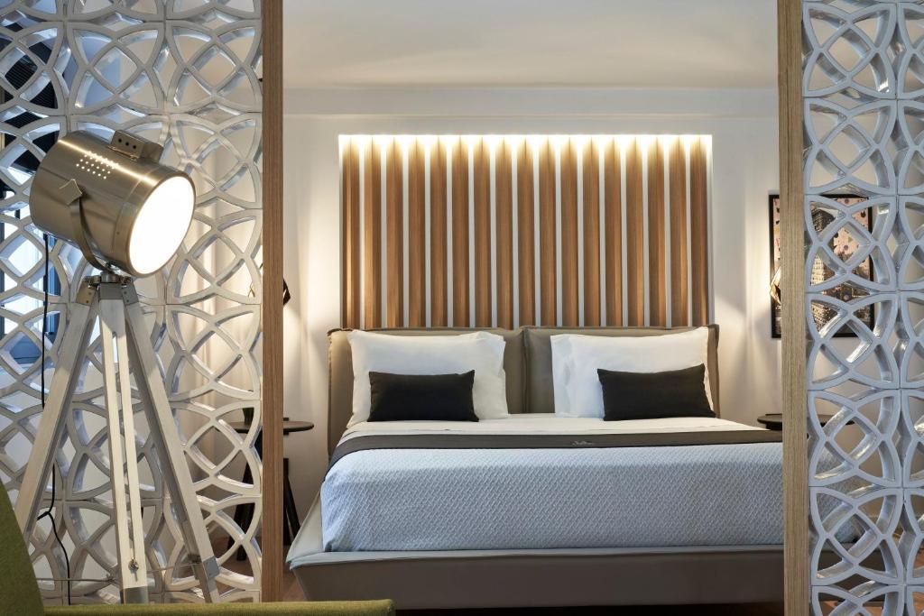 Posteľ alebo postele v izbe v ubytovaní Kolonaki 8 - Design Suites & Lofts