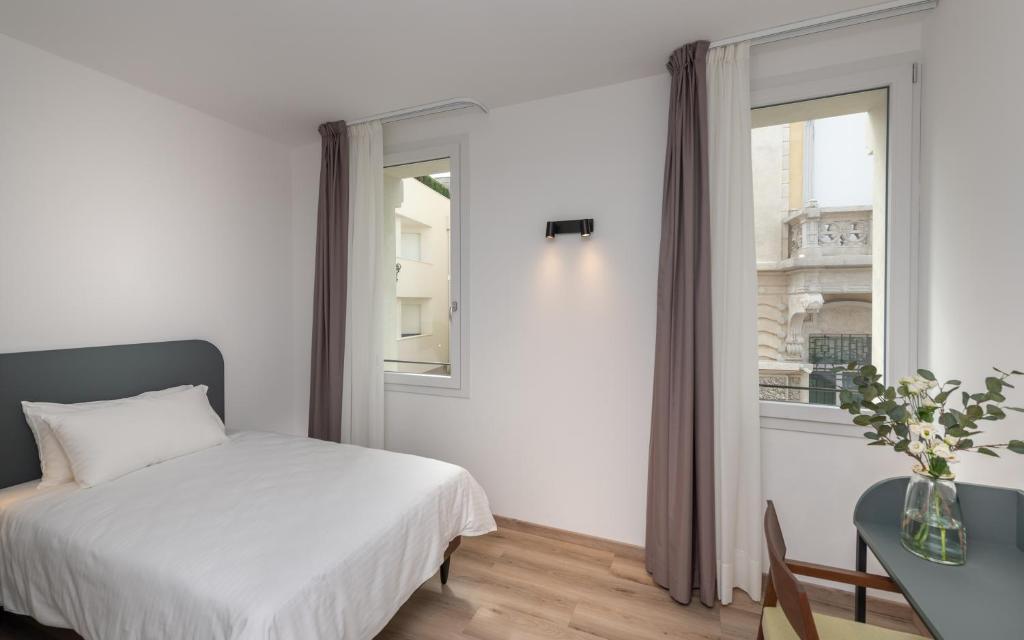 Postel nebo postele na pokoji v ubytování Hotel Canton dell'Orto