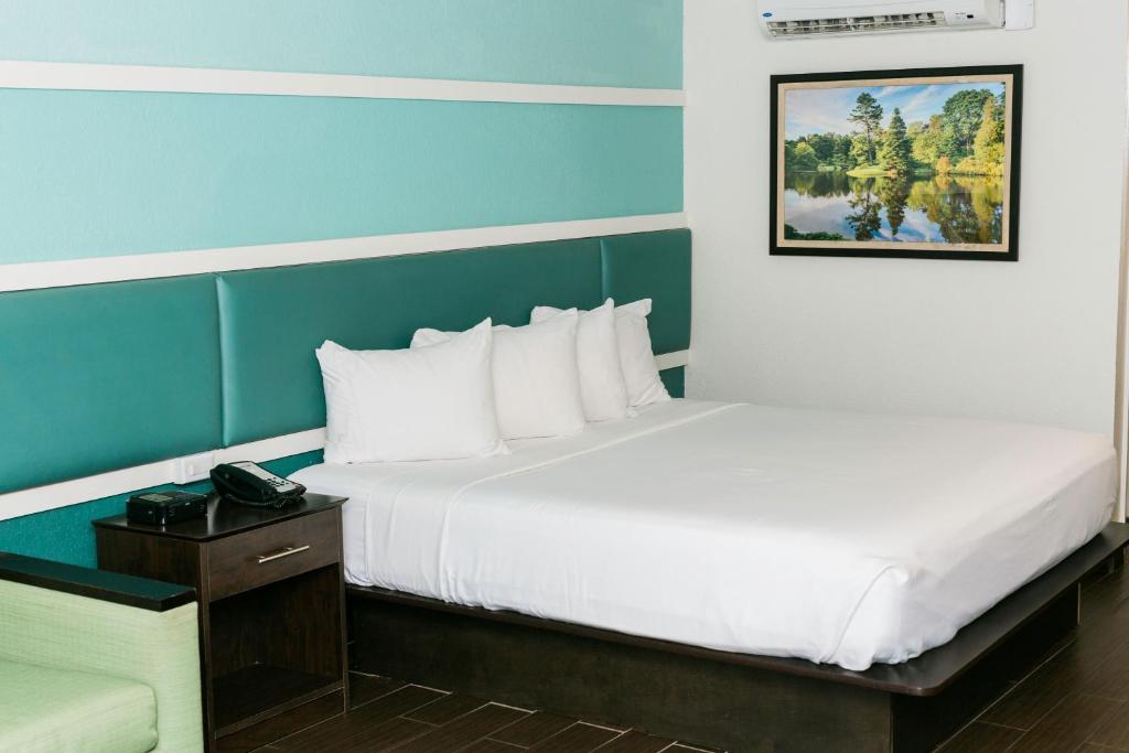 Voodi või voodid majutusasutuse The Flagler Inn - Saint Augustine toas