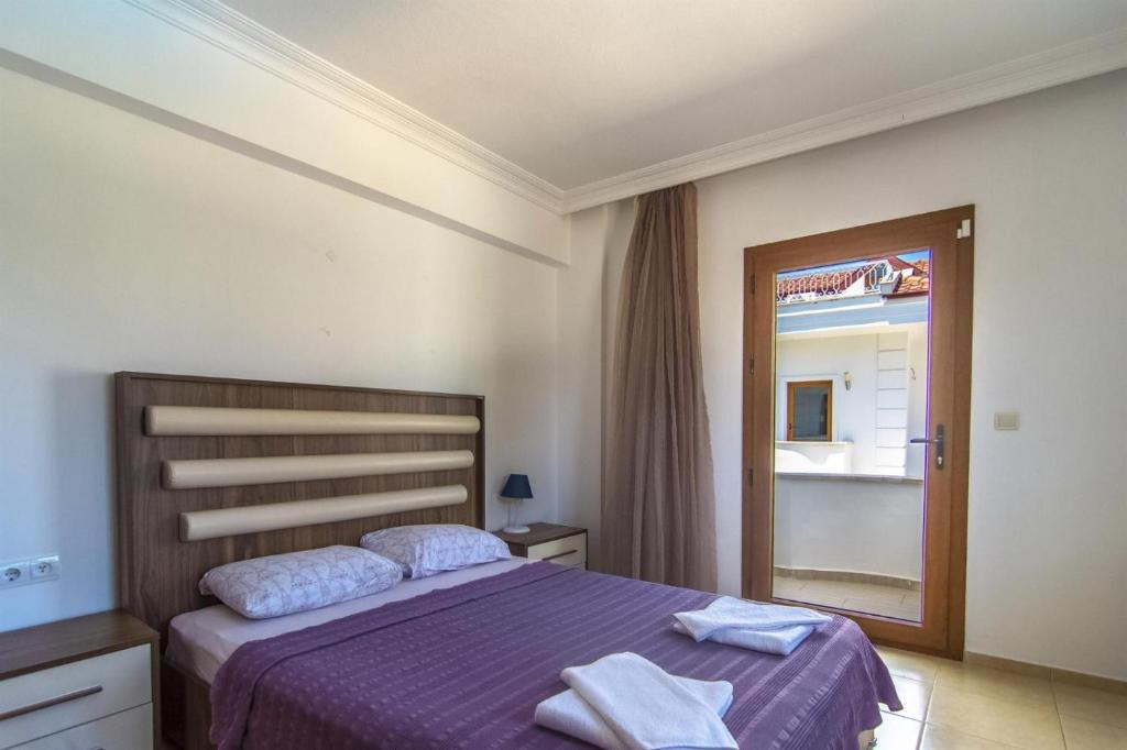 Postel nebo postele na pokoji v ubytování Villa Ekin
