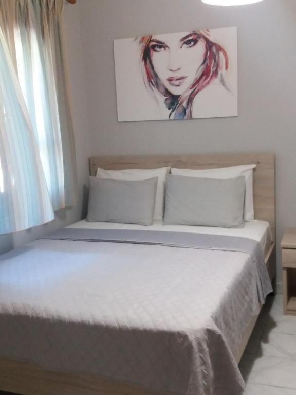 Posteľ alebo postele v izbe v ubytovaní Vourvourou Antonis House