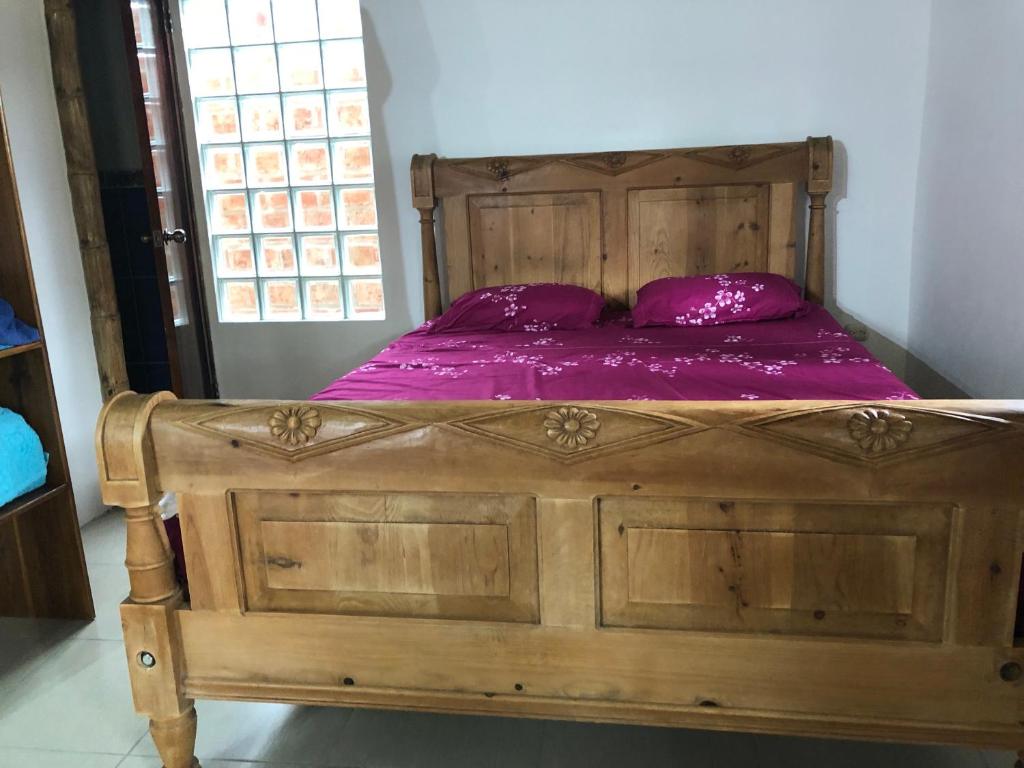 Postel nebo postele na pokoji v ubytování CanoaOasis