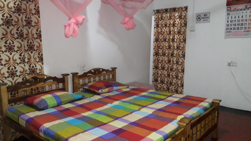 Postel nebo postele na pokoji v ubytování DERO BEACH HOLIDAY HOME
