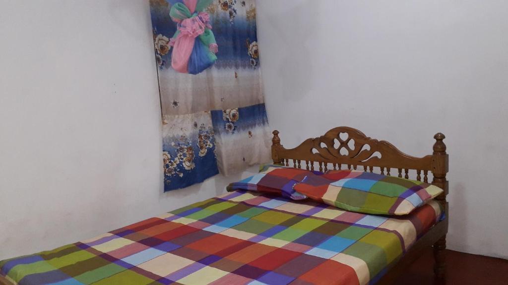 Postel nebo postele na pokoji v ubytování DERO BEACH HOLIDAY HOME