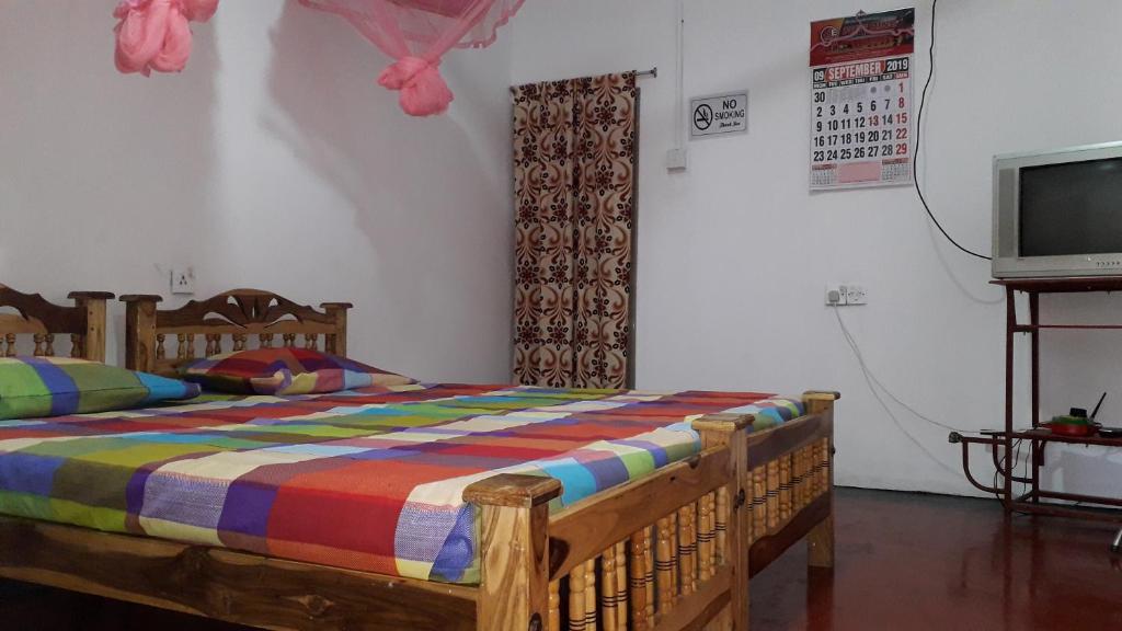 Postel nebo postele na pokoji v ubytování DERO BEACH HOLIDAY HOME