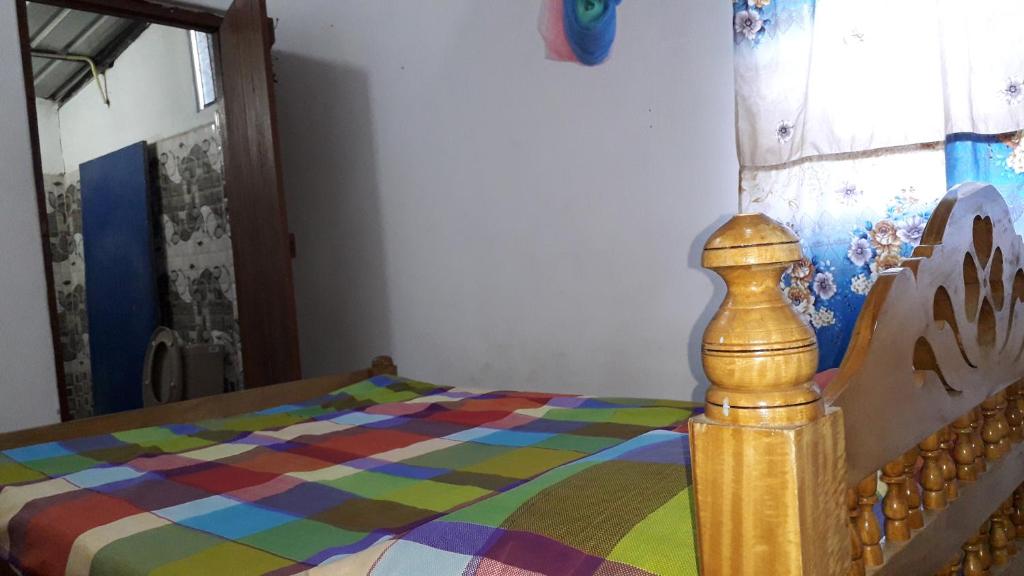 Postel nebo postele na pokoji v ubytování DERO BEACH HOLIDAY HOME