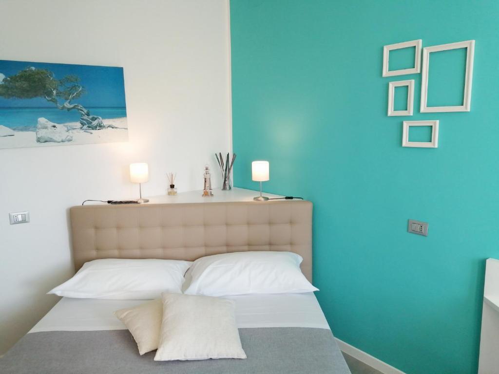 Postel nebo postele na pokoji v ubytování Dimora Chlóe B&B