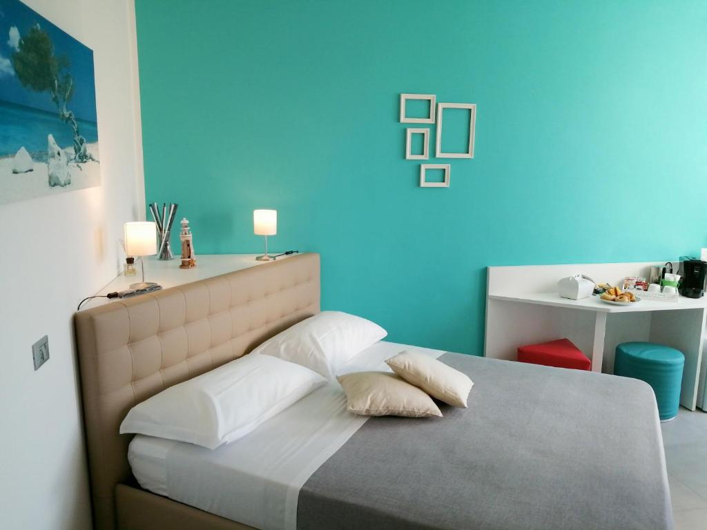 Postel nebo postele na pokoji v ubytování Dimora Chlóe B&B