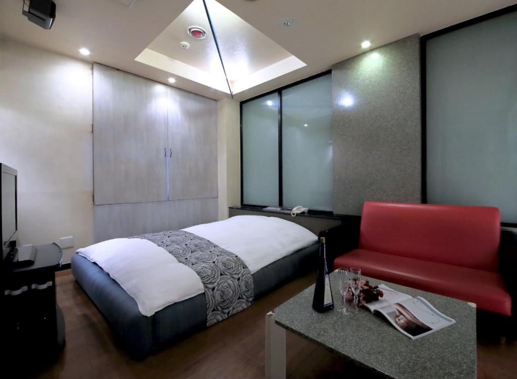 Postel nebo postele na pokoji v ubytování Hotel Mio City (Adult Only)