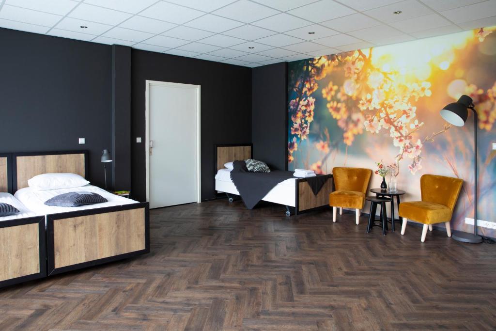 Postel nebo postele na pokoji v ubytování Hotel Spelderholt