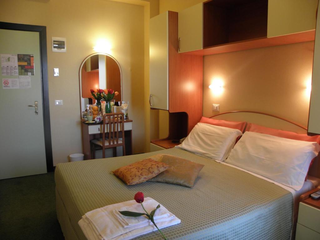 Postel nebo postele na pokoji v ubytování Hotel Crosal