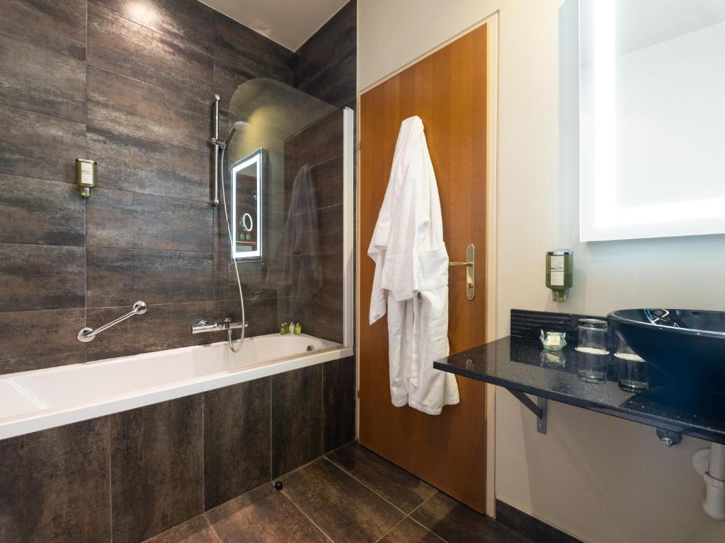 Koupelna v ubytování Hotel Josefshof am Rathaus