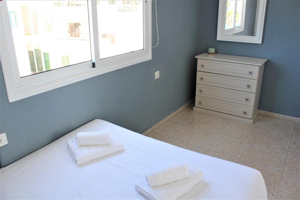 Posteľ alebo postele v izbe v ubytovaní Apartamento con vistas, playa y WIFI