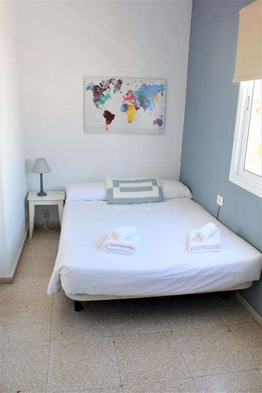 Posteľ alebo postele v izbe v ubytovaní Apartamento con vistas, playa y WIFI