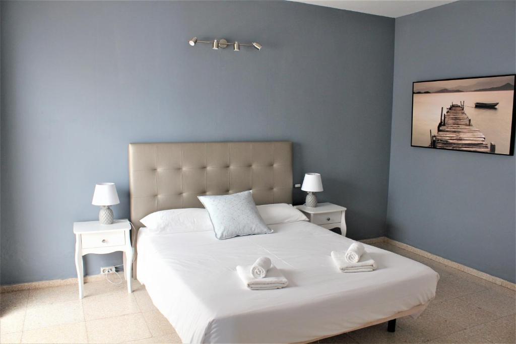 Posteľ alebo postele v izbe v ubytovaní Apartamento con vistas, playa y WIFI