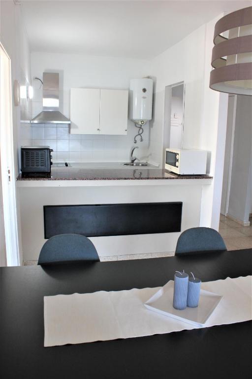 Kuchyňa alebo kuchynka v ubytovaní Apartamento con vistas, playa y WIFI