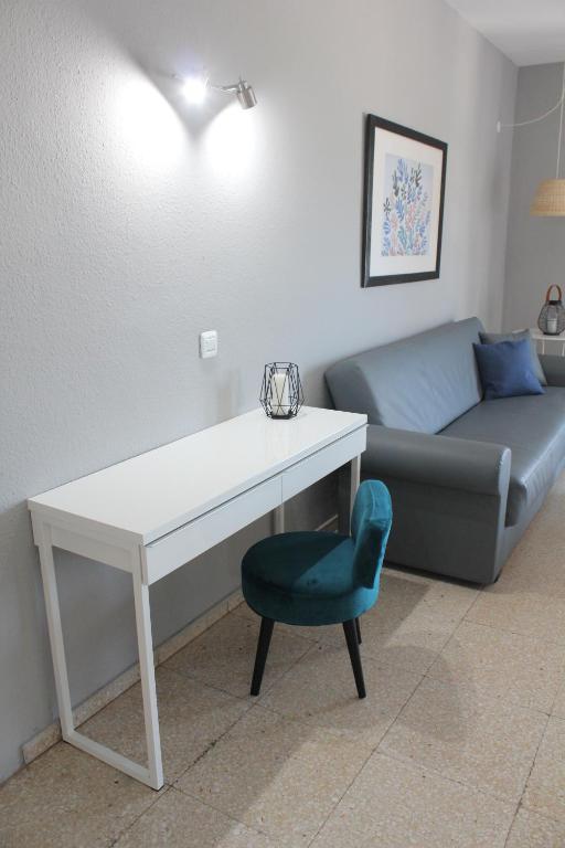 Posedenie v ubytovaní Apartamento con vistas, playa y WIFI